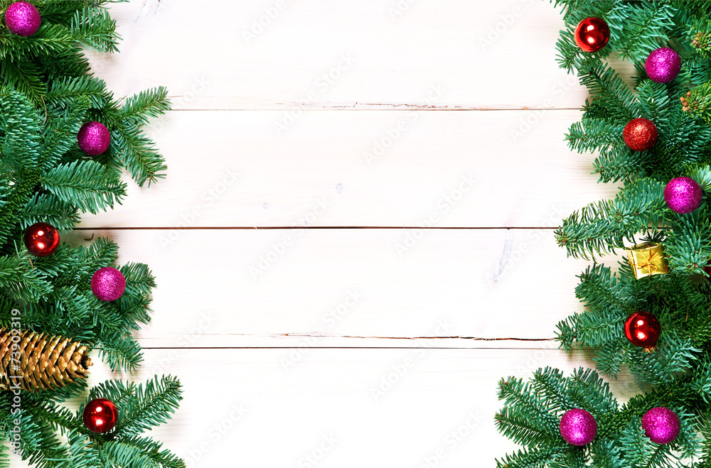 Christmas background with spruce tree and christmas balls on tab Christmas background with spruce tree and christmas balls on tab