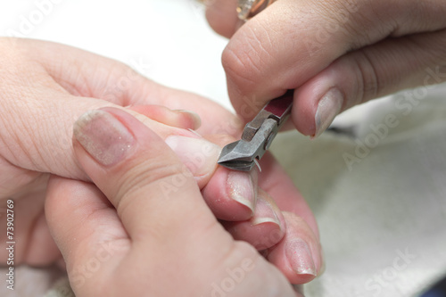 nail polish on the nails in a beauty salon