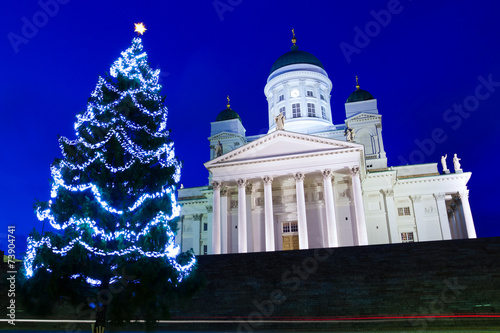Famous Helsinki Cathedral with Christmas tree at twilight