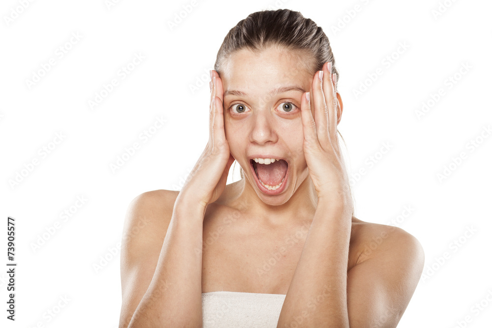 surprised young woman covering her head with her hands surprised young woman covering her head with her hands