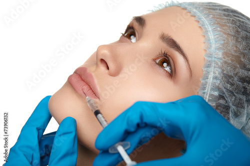 Beautiful woman receiving cosmetic injections