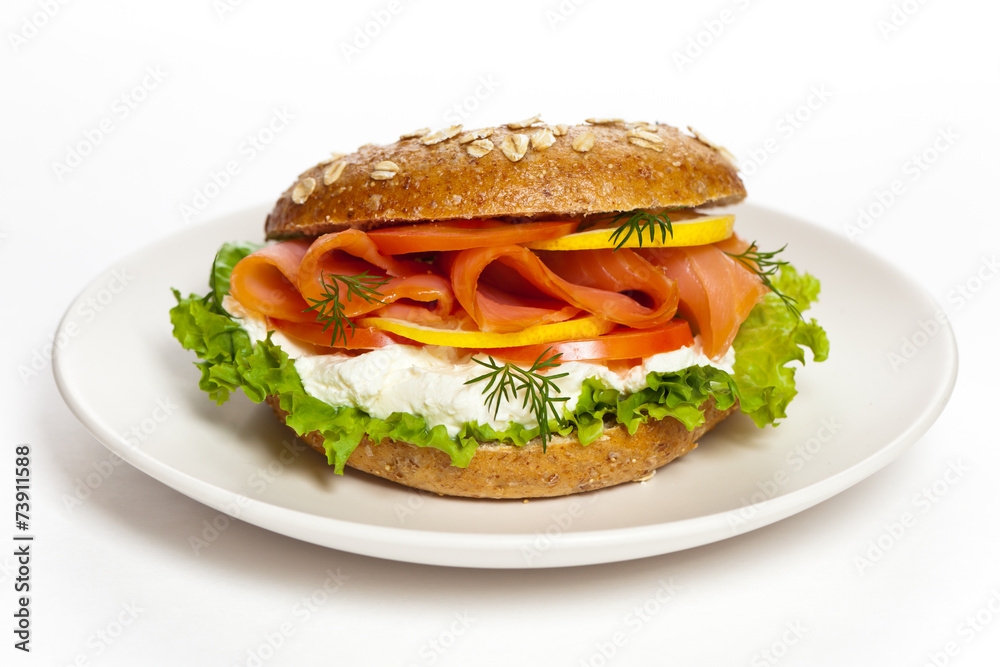 Cream cheese and smoked salmon bagel. Selective focus.