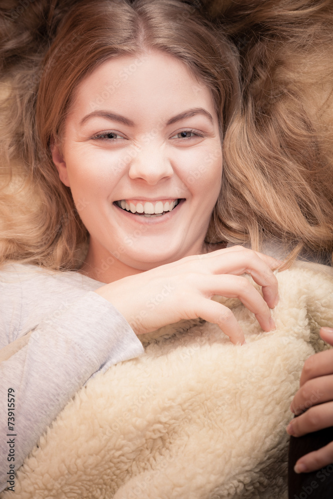 smiling woman waking up on bed smiling woman waking up on bed