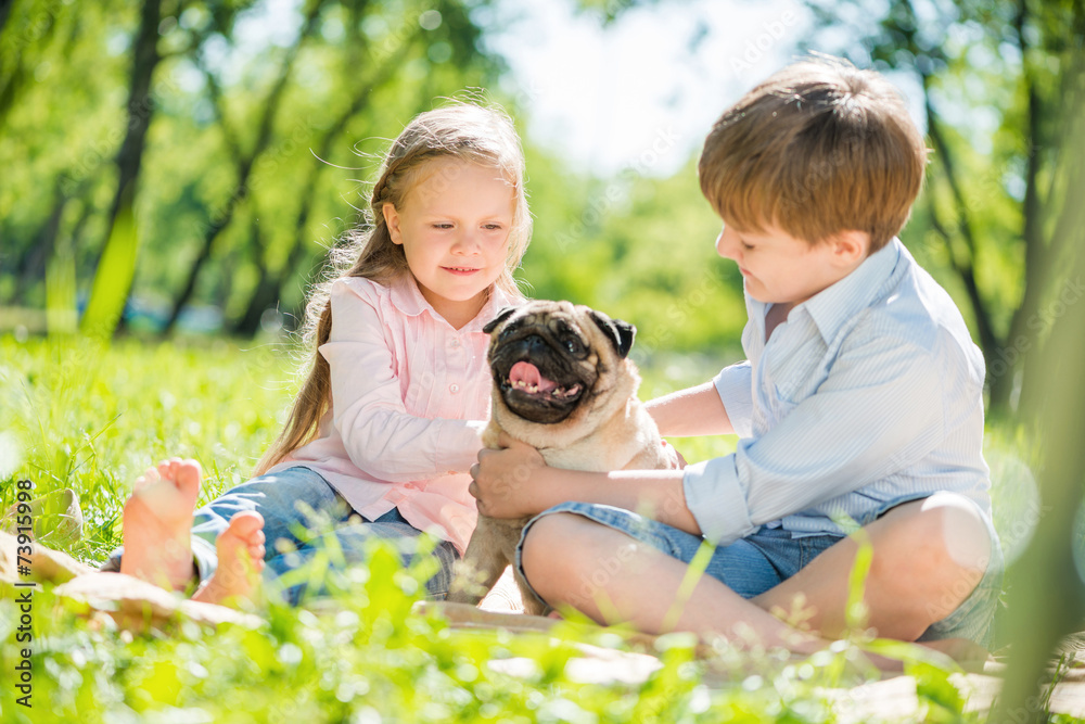 Children in park with pet Children in park with pet