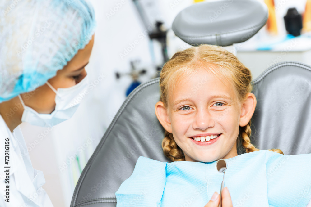 Dentist inspecting patient Dentist inspecting patient