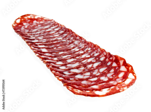 Slices of sausage isolated on a white background © domnitsky