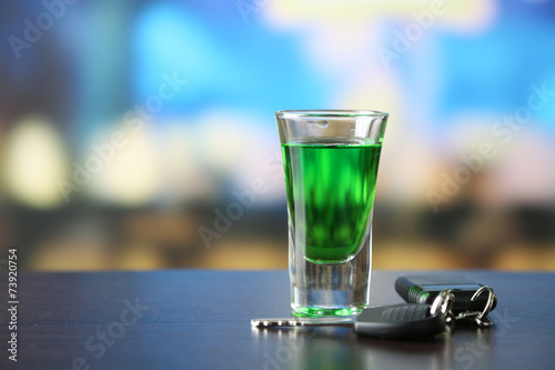 Glass of alcoholic drink and car key, © Africa Studio