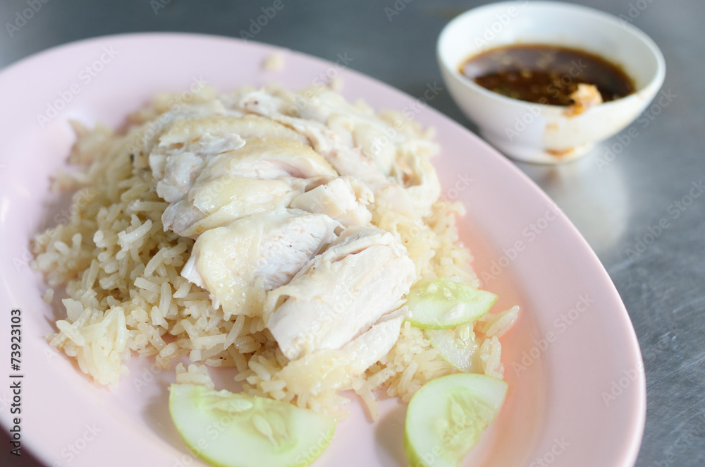 Boned, sliced Hainan-style chicken with marinated rice Boned, sliced Hainan-style chicken with marinated rice