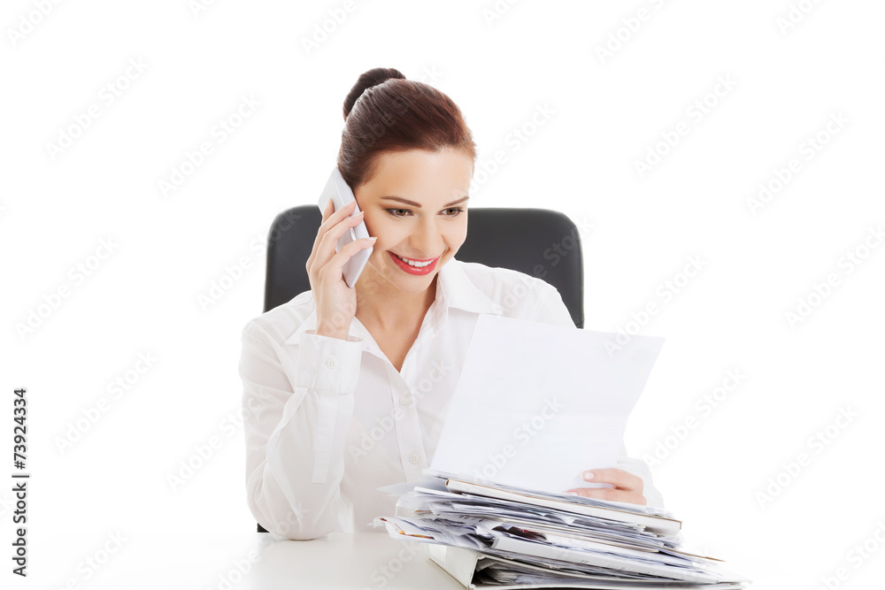 Young business woman talking on the phone Young business woman talking on the phone