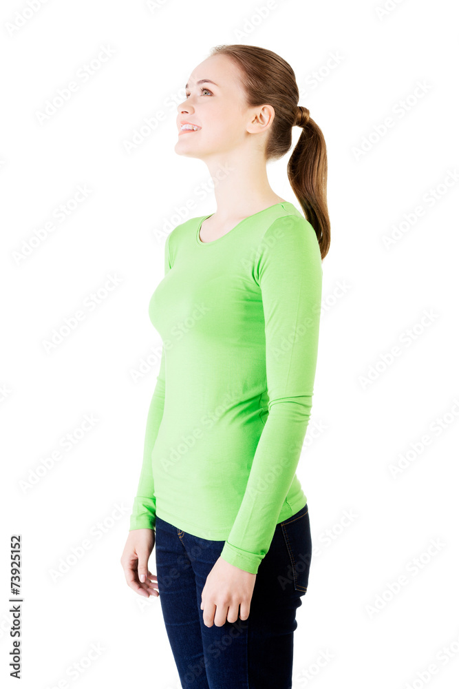 Thoughtful woman looking up on copyspace Thoughtful woman looking up on copyspace