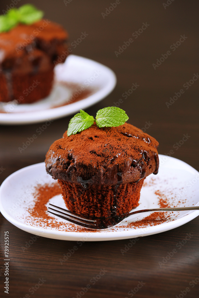 Yummy chocolate cupcake on table Yummy chocolate cupcake on table