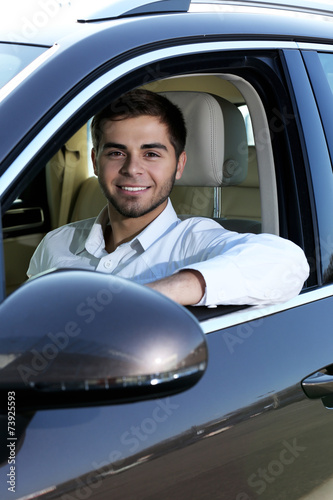Young man in car