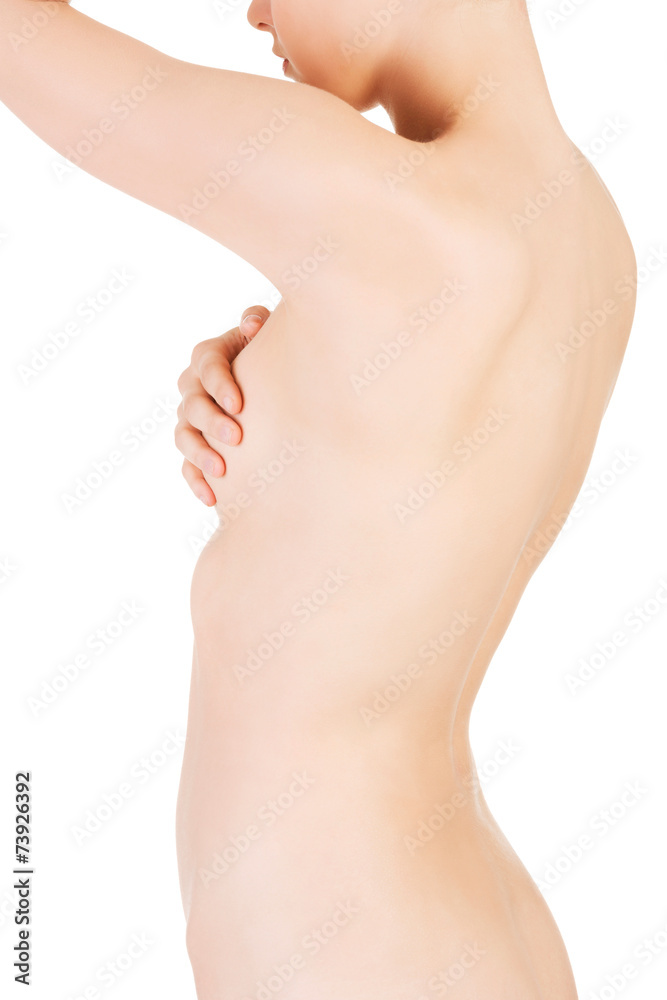 Fototapeta premium Close up on nude woman touching her breast