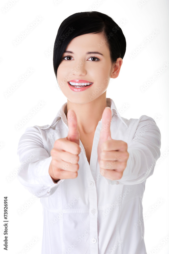 Happy smiling businesswoman with thumbs up gesture Happy smiling businesswoman with thumbs up gesture