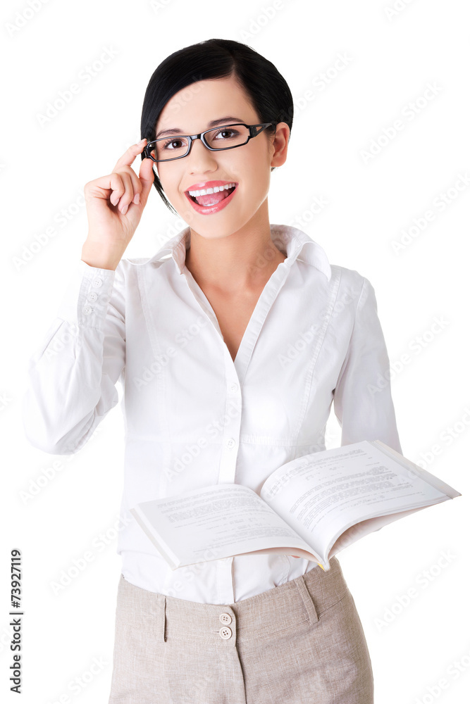 Portrait of woman in eyewear holding a book Portrait of woman in eyewear holding a book