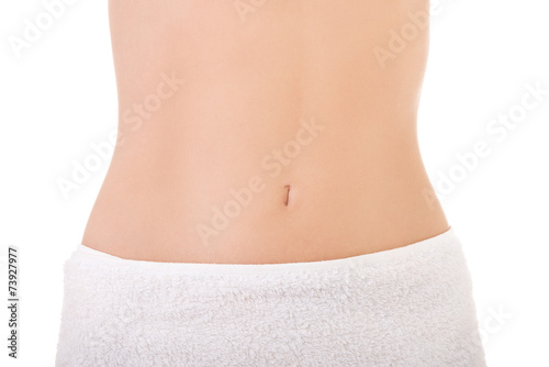 Close up on slim woman belly