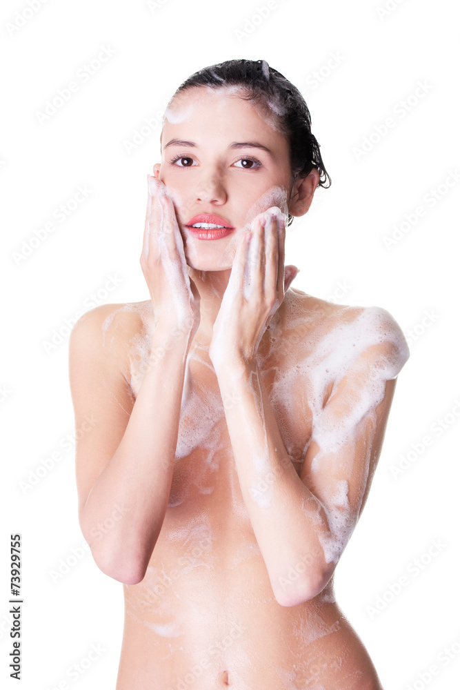 Foto Stock Portrait of young sexy woman with soap foam | Adobe Stock