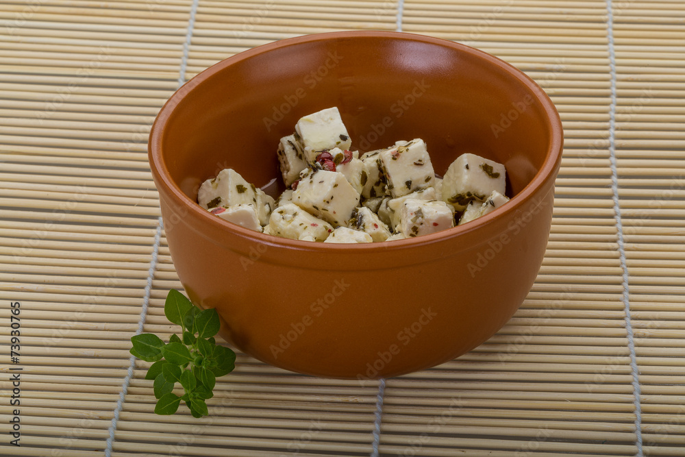 Cheese with spices and oil