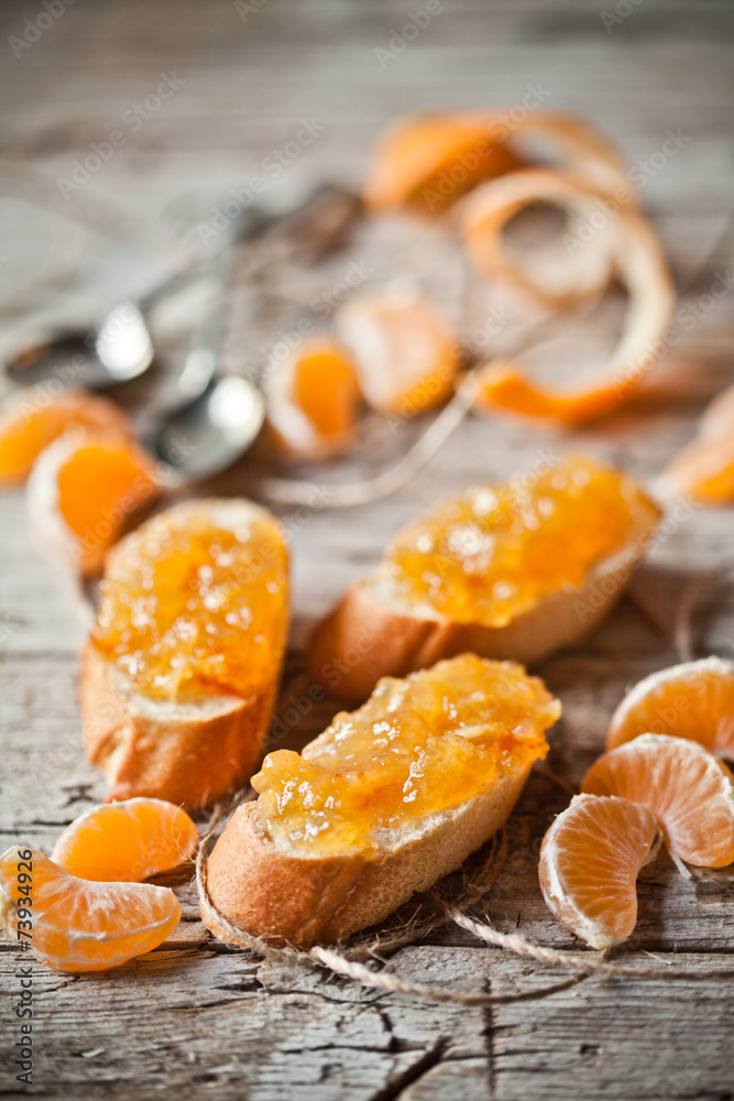 pieces of baguette with orange marmalade pieces of baguette with orange marmalade