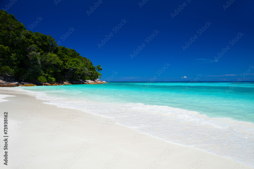 White sand beach blue sea with clear sky