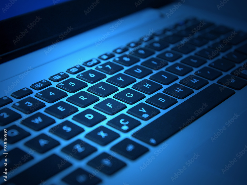 laptop keyboard with black keys closeup