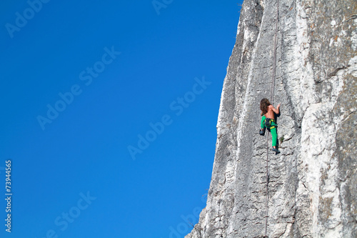 Young boy rock climber