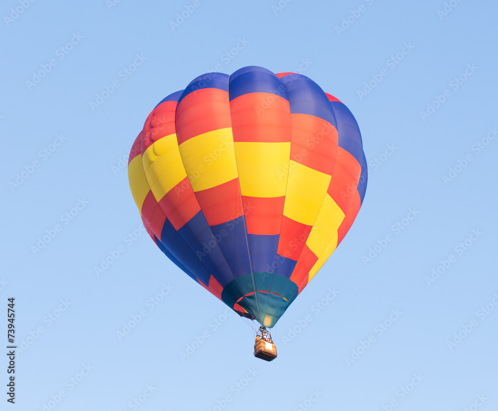 Naklejka premium Hot air balloon with blue sky background
