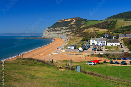 Summer day on the beach in Seatown, Dorset, UK. photo