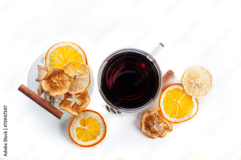mulled wine with spices, ginger, cinnamon on a white background mulled wine with spices, ginger, cinnamon on a white background