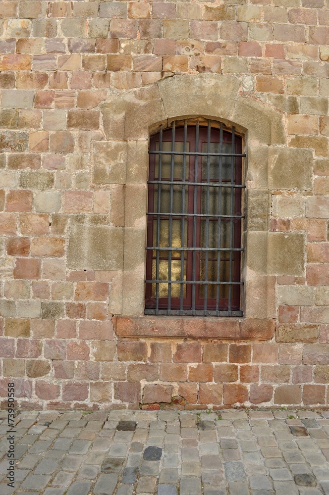 Rusty window, Montjuïc castle, Barcelona, Spain; military prison Rusty window, Montjuïc castle, Barcelona, Spain; military prison