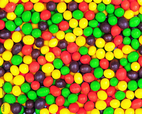 Multicolored candies for use as background. photo