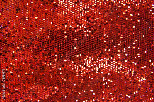 red sequins textile background photo
