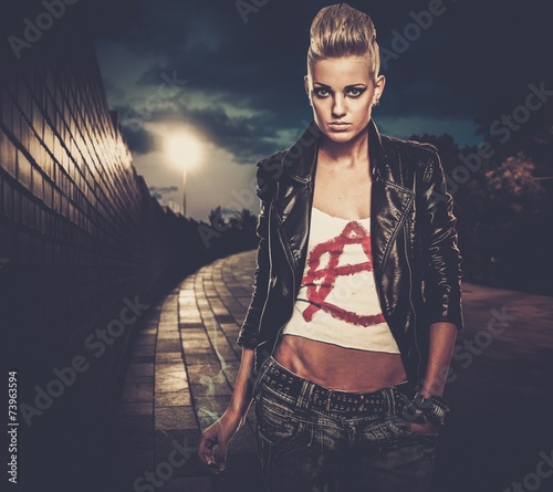 Fotografie, Obraz Punk girl with cigarette outdoors at night