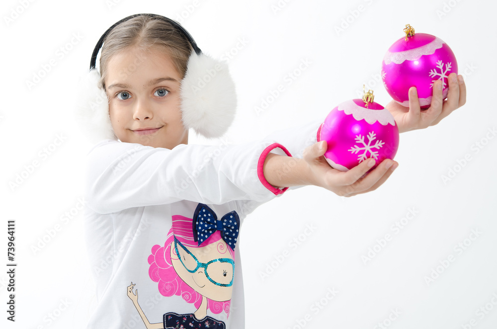 beautiful girl holding a Christmas decorative ball beautiful girl holding a Christmas decorative ball