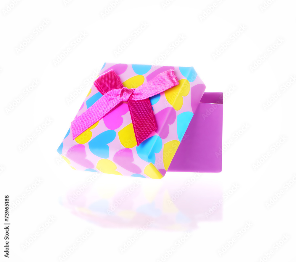 Gift box with bow isolated on white background Gift box with bow isolated on white background