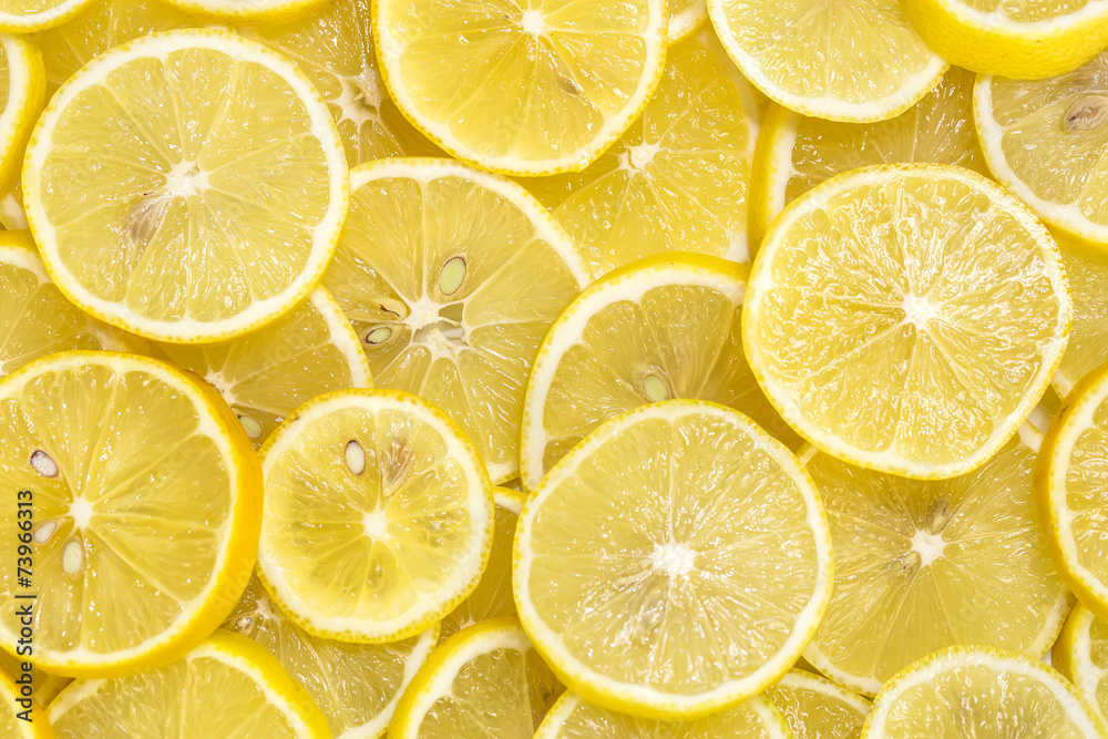 background of sliced ripe lemons background of sliced ripe lemons