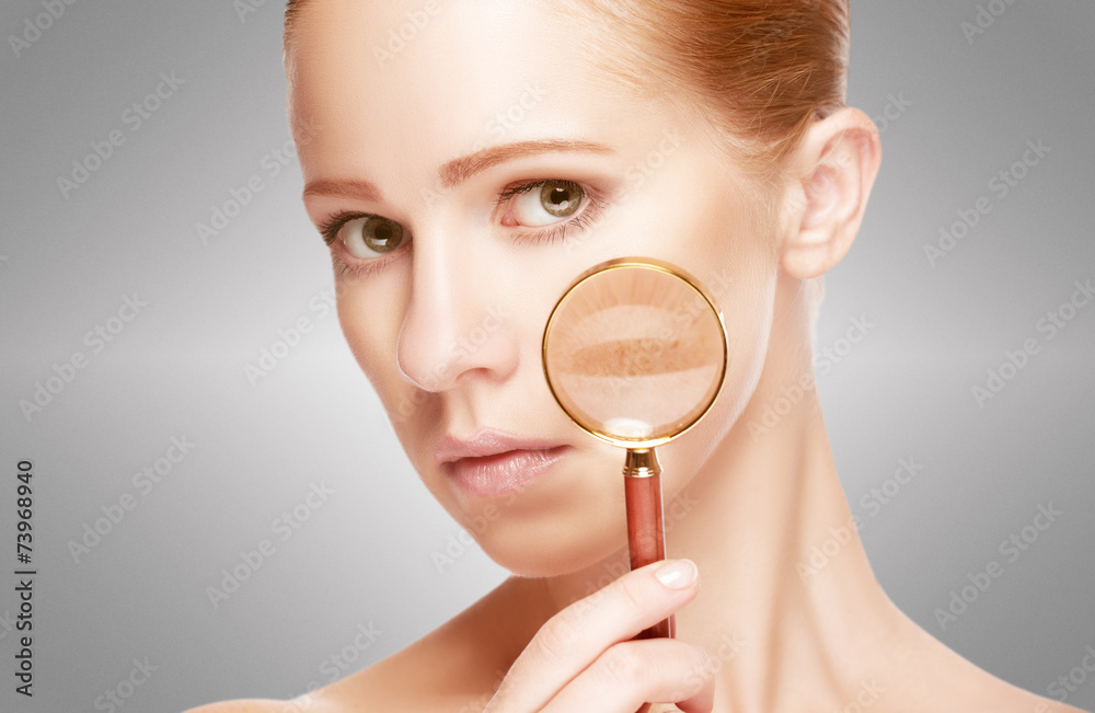 concept skincare. Skin of woman with magnifier concept skincare. Skin of woman with magnifier