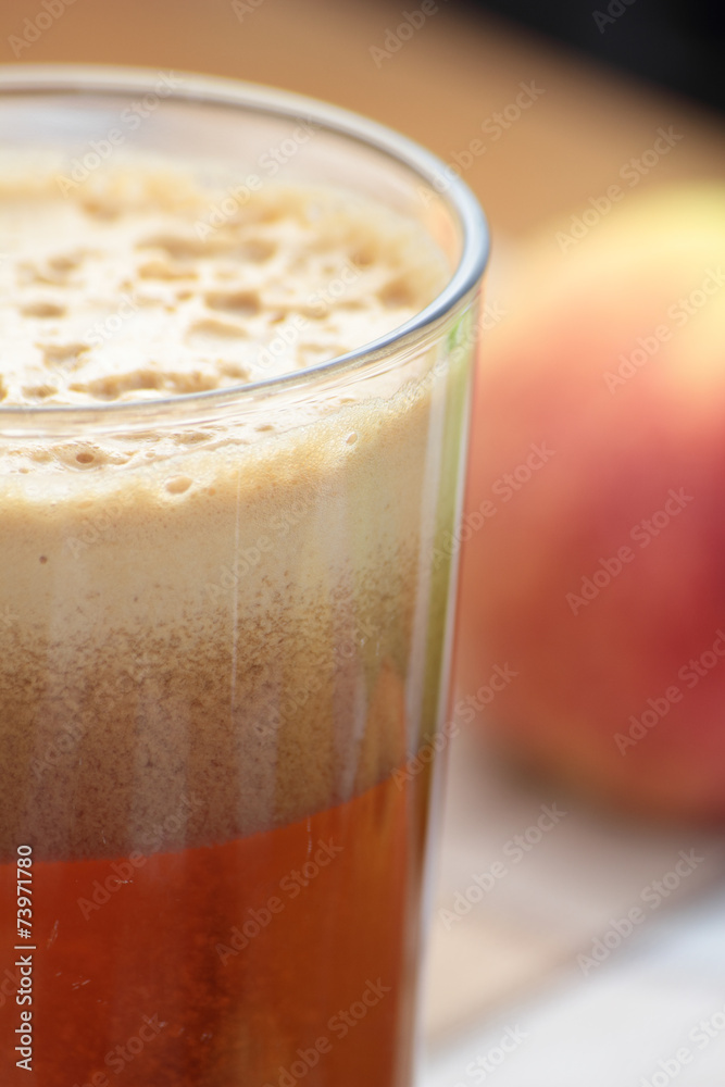Glass of freshly squeezed apple and pear juice. Glass of freshly squeezed apple and pear juice.