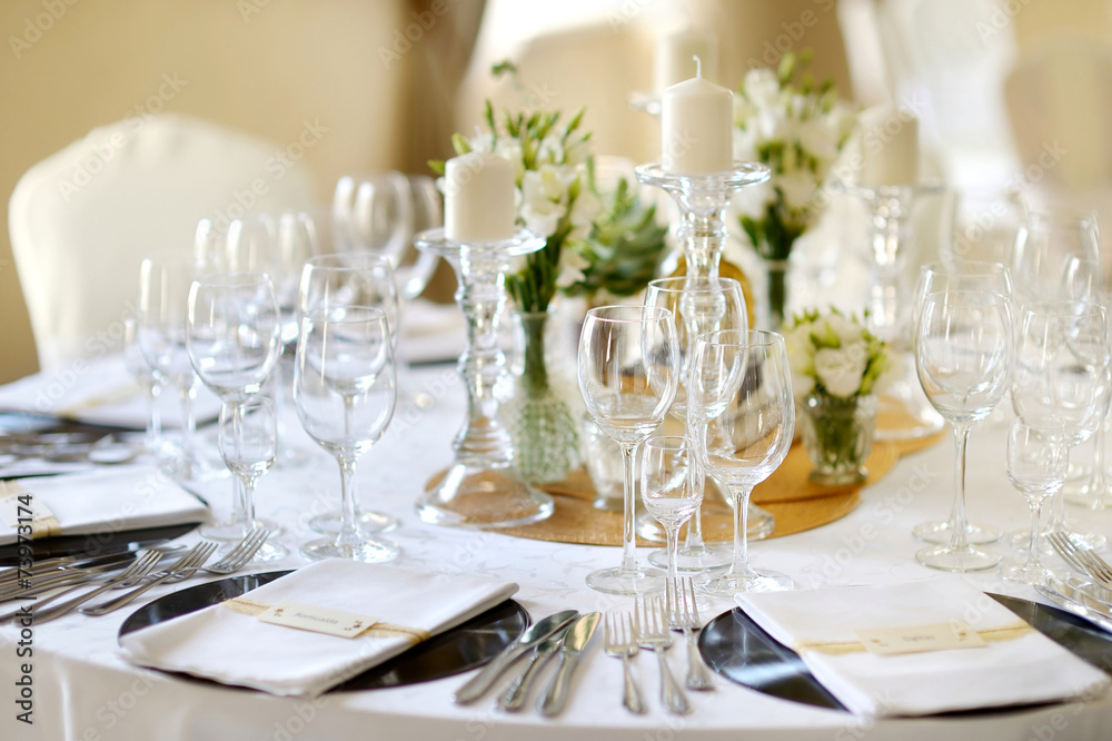 Table set for an event party or wedding reception Table set for an event party or wedding reception