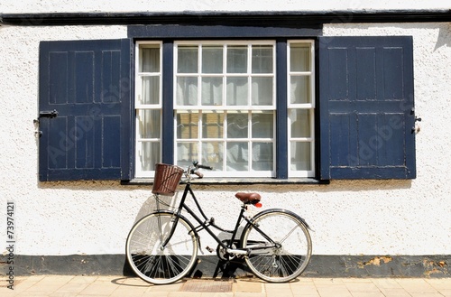 Bicycle against old building in Oxford, Oxfordshire, England.