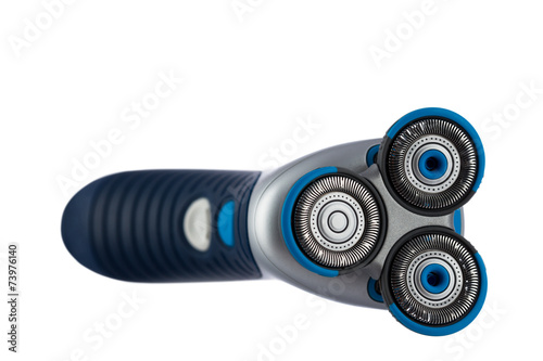 Electric shaver closeup on white background.