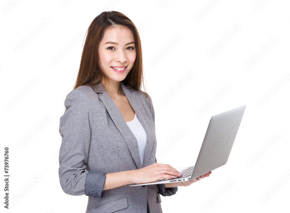 Businesswoman use of notebook Businesswoman use of notebook