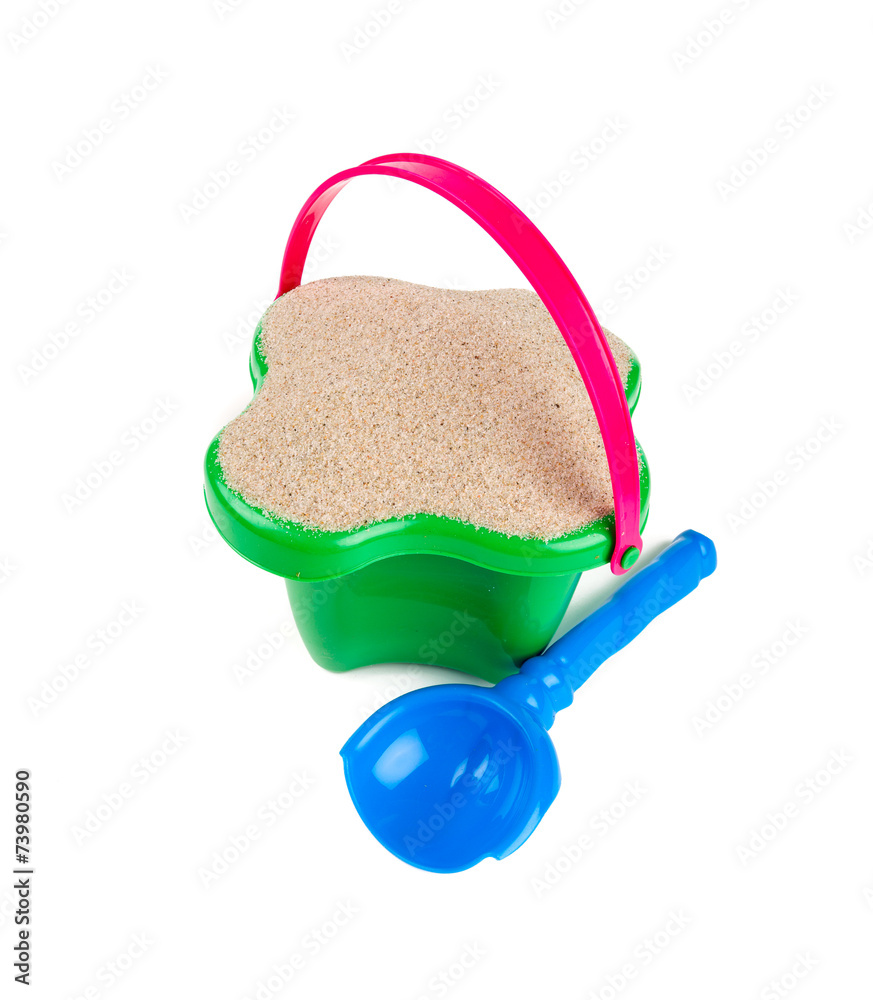 Obraz premium beach sand, shovel and bucket