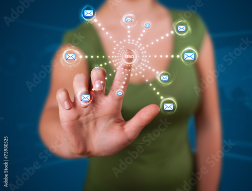 Woman pressing virtual messaging type of icons