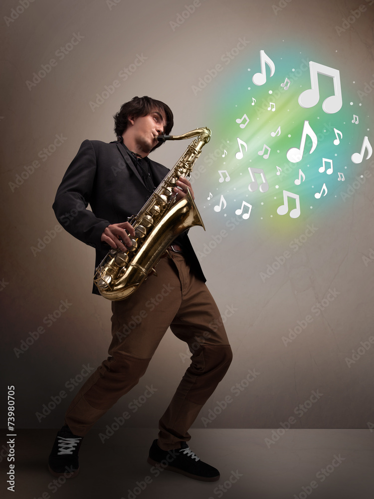 Naklejka premium Young musician playing on saxophone while musical notes explodin