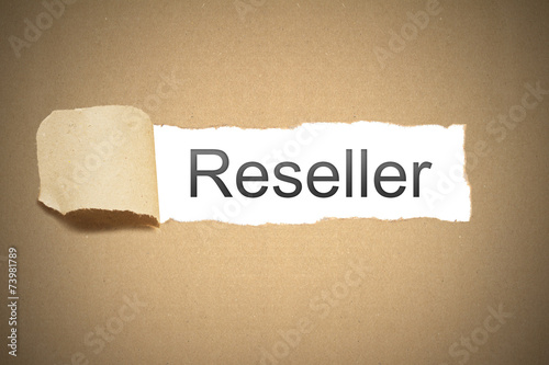 brown paper torn to reveal reseller