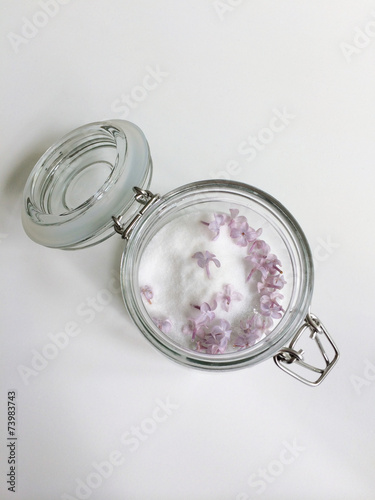 Glass jar of white sugar photo