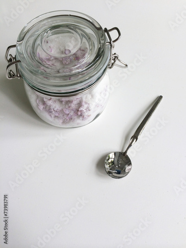 Glass jar of white sugar photo