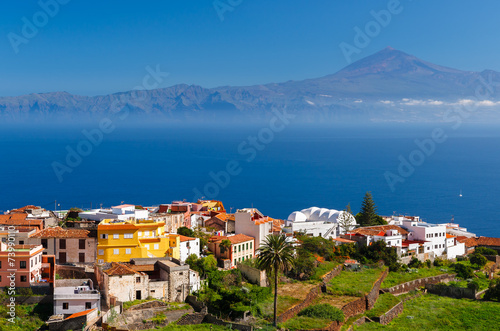 View of Agulo town and Teide volcano in distance, La Gomera photo