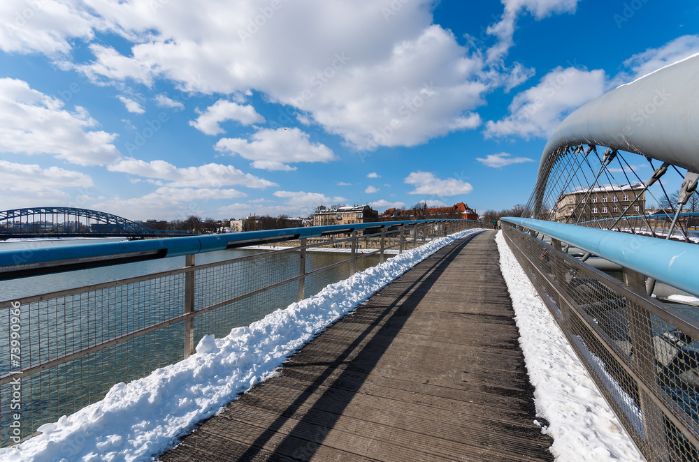 Bernatka bridge on Vistula river in winter, Krakow, Poland